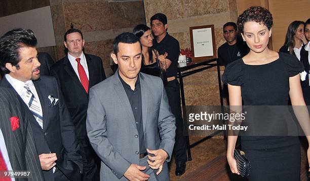 Anil Kapoor, Kangana Ranaut and Aamir Khan at the fundraising event 'Hope for Haiti - India Cares' in Mumbai on March 21, 2010.