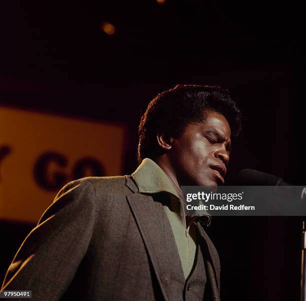 American soul singer and songwriter James Brown performs live on stage with The Famous Flames on the set of the Associated Rediffusion Television pop...