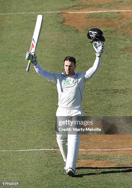 Brendon McCullum of New Zealand celebrates after scoring 100 runs during day five of the First Test match between New Zealand and Australia at...