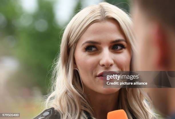 June 2018, Germany, Cologne: Lena Gercke, German model, attends the 'Tee Off-Night' in the course of the golf tournament '30th BMW International...