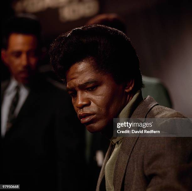 American soul singer and songwriter James Brown performs live on stage with The Famous Flames on the set of the Associated Rediffusion Television pop...