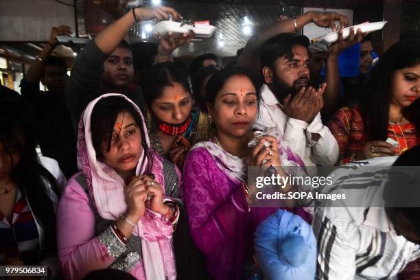 Hindu Devotees pray during the annual Hindu festival at the Kheer Bhawani Temple in Ganderbal district, some 30kms northeast of Srinagar, Indian...