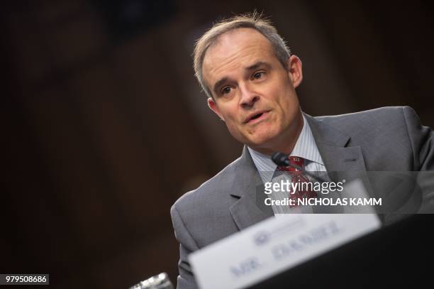 Former White House cybersecurity coordinator Michael Daniel testifies before the Senate Intelligence Committee during a hearing on "Policy Response...