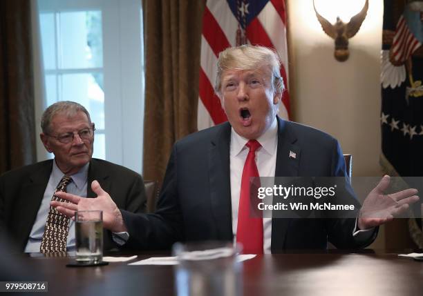 President Donald Trump speaks on immigration issues while meeting with members of the U.S. Congress in the Cabinet Room of the White House June 20,...