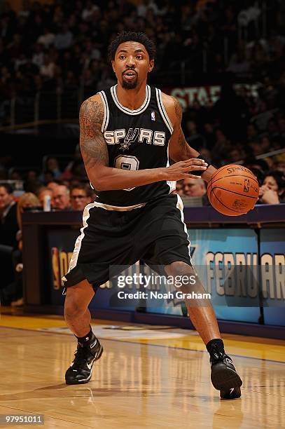 Roger Mason Jr. #8 of the San Antonio Spurs handles the ball against the Los Angeles Lakers during the game on February 8, 2010 at Staples Center in...