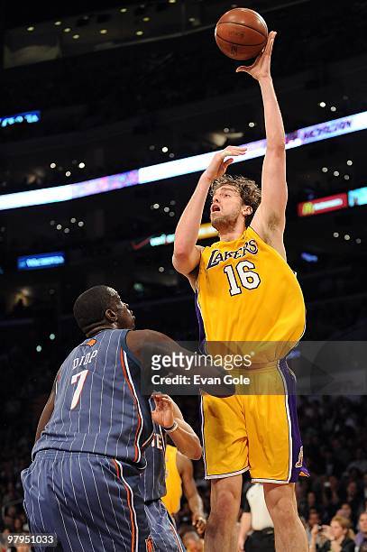 Pau Gasol of the Los Angeles Lakers puts up a shot over DeSagana Diop of the Charlotte Bobcats during the game on February 3, 2010 at Staples Center...