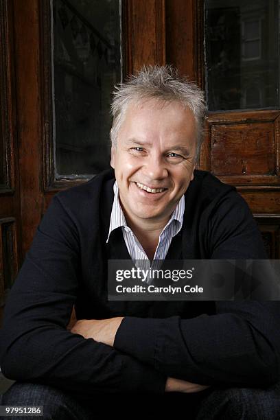 Actor Tim Robbins poses for a portrait session for the Los Angeles Times on the front stoop where he grew up in the SoHo neighborhood of New York on...