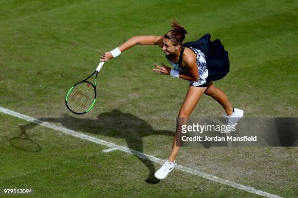 Petra Martic of Croatia serves during her Round of 16 match against Mihaela Buzarnescu of Romania during Day Five of the Nature Valley Classic at...