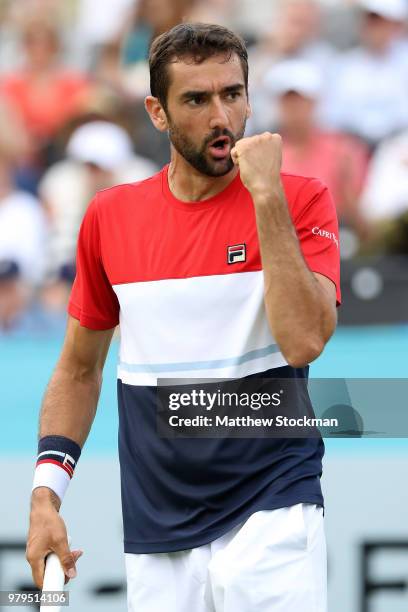 Marin Cilic of Croatia celebrates winning a point during his match against Gilles Muller of Luxembourg on Day Three of the Fever-Tree Championships...