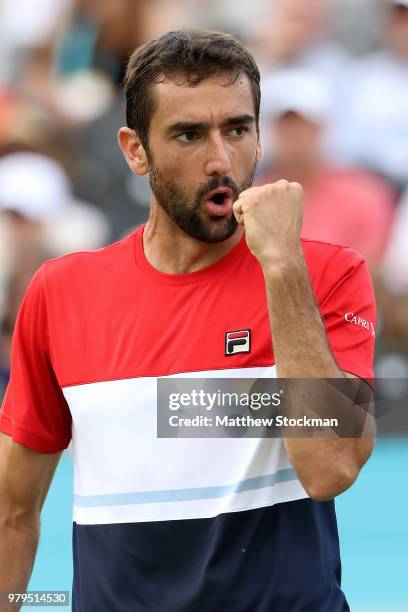 Marin Cilic of Croatia celebrates winning a point during his match against Gilles Muller of Luxembourg on Day Three of the Fever-Tree Championships...