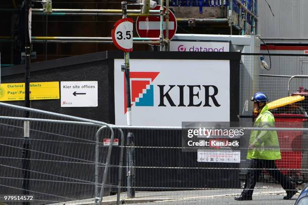 Sign carrying the logo of Kier Construction, the main contractor for the restoration works under way at the Glasgow School of Art Mackintosh building...