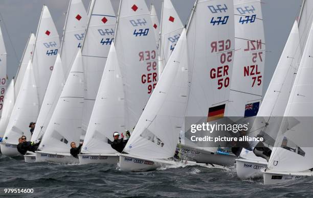 June 2018, Germany, Kiel: Sailers in the 470 class participate in a race on the Schilksee as part of the Kiel Week. The Kiel Week is the world's...