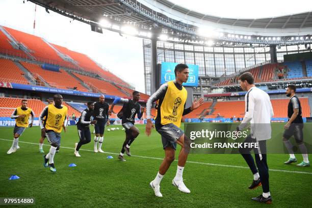 France's defender Raphael Varane attends a training session at the Ekaterinburg Arena in Ekaterinburg on June 20, 2018 on the eve of the Russia 2018...