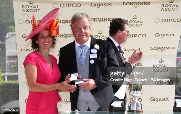 Alex Polizzi presents the prize to the trainer of Expert Eye, Sir Michael Stoute after winning the Jersey Stakes during day two of Royal Ascot at...