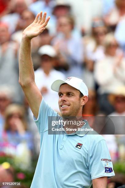 Sam Querrey of The USA celebrates winning his match against Stan Wawrinka of Switzerland on Day Three of the Fever-Tree Championships at Queens Club...