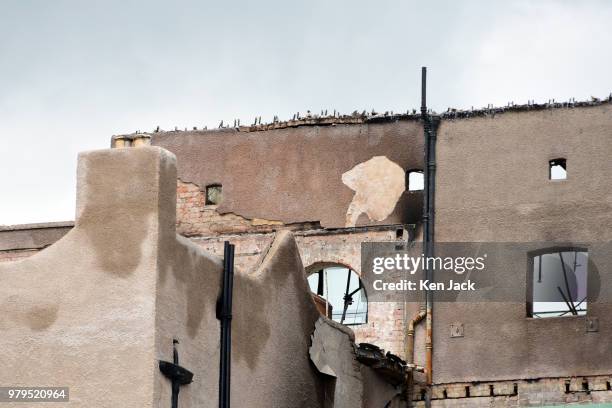 Smoke-blackened remains of the Glasgow School of Art Mackintosh building, which was completly burned out in a major fire, still carry recognisable...