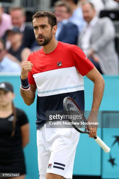 Marin Cilic of Croatia celebrates winning a point during his match against Gilles Muller of Luxembourg on Day Three of the Fever-Tree Championships...