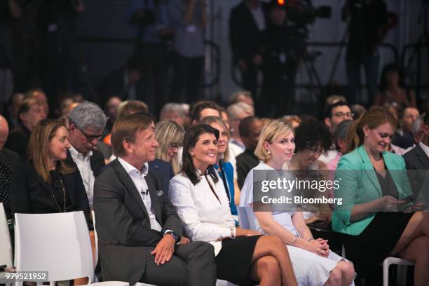 Hakan Samuelsson, president and chief executive officer of Volvo Cars NV, from front left, and Nikki Haley, U.S. Ambassador to the United Nations ,...