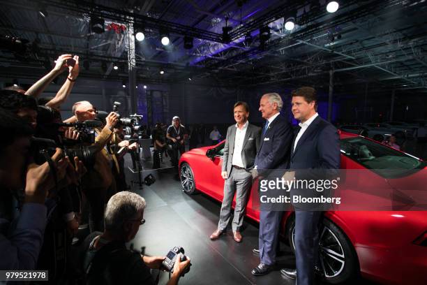 Hakan Samuelsson, president and chief executive officer of Volvo Cars NV, from left, Henry McMaster, governor of South Carolina, and Anders...