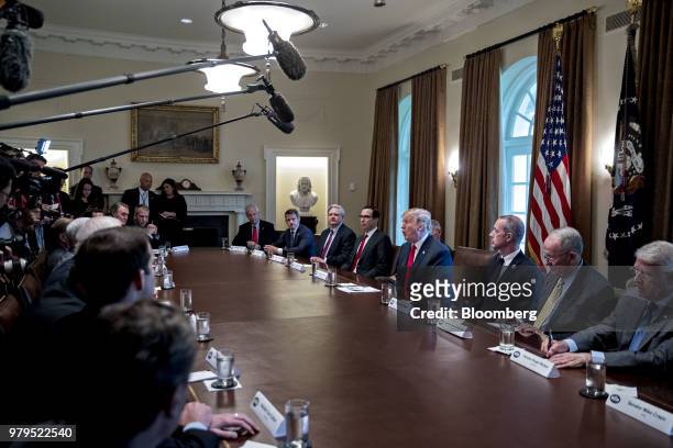 President Donald Trump, center right, speaks during a meeting with Republican members of Congress in the Cabinet Room of the White House in...