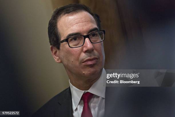 Steven Mnuchin, U.S. Treasury secretary, listens during a meeting with Republican members of Congress in the Cabinet Room of the White House in...