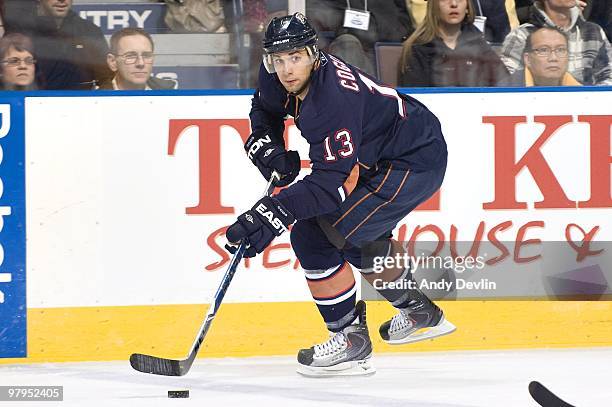 Andrew Cogliano of the Edmonton Oilers carries the puck into the offensive zone during a game against the Detroit Red Wings at Rexall Place on March...