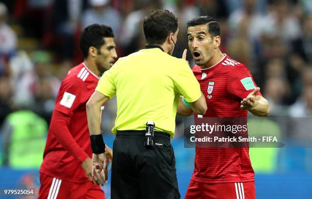 Ehsan Haji Safi of Iran argues with Referee Andres Cunha during the 2018 FIFA World Cup Russia group B match between Iran and Spain at Kazan Arena on...