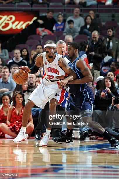 Richard Hamilton of the Detroit Pistons posts up against Wesley Matthews of the Utah Jazz during the game at the Palace of Auburn Hills on March 10,...