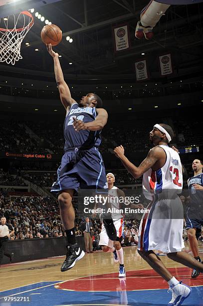 Wesley Matthews of the Utah Jazz shoots a layup against Richard Hamilton of the Detroit Pistons during the game at the Palace of Auburn Hills on...