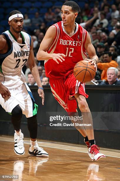 Kevin Martin of the Minnesota Timberwolves drives the ball up court past Corey Brewer of the Houston Rockets during the game at Target Center on...