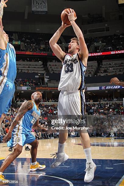 Marc Gasol of the Memphis Grizzlies goes up for a shot during the game against the Denver Nuggets during the game at the FedExForum on March 13, 2010...