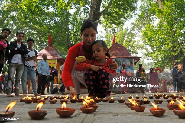 Devotees light earthen lamps on the occasion of Jyestha Ashtami at the Kheer Bhawani Temple on June 20, 2018 at Tulla Mulla, Ganderbal, 28 Km...