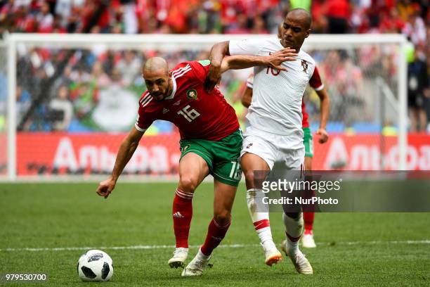 Noureddine Amrabat of Morroco fight for the ball with Joao Mario of Portugal during the 2018 FIFA World Cup Group B match between Portugal and...