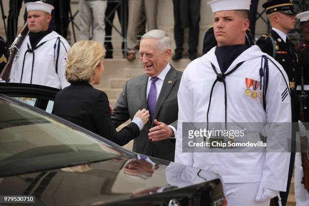 Defense Secretary James Mattis greets German Defence Minister Ursula von der Leyen outside the Pentagon June 20, 2018 in Arlington, Virginia. Von der...