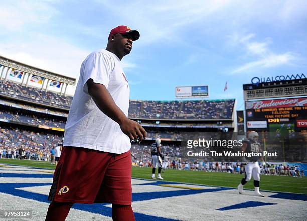 Washington Reskins defensive tackle Albert Haynesworth walks onto the field not dressed for the game against San Diego January 3, 2010.