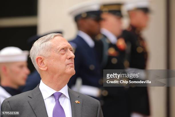 Defense Secretary James Mattis waits for the arrival of German Defence Minister Ursula von der Leyen outside the Pentagon June 20, 2018 in Arlington,...