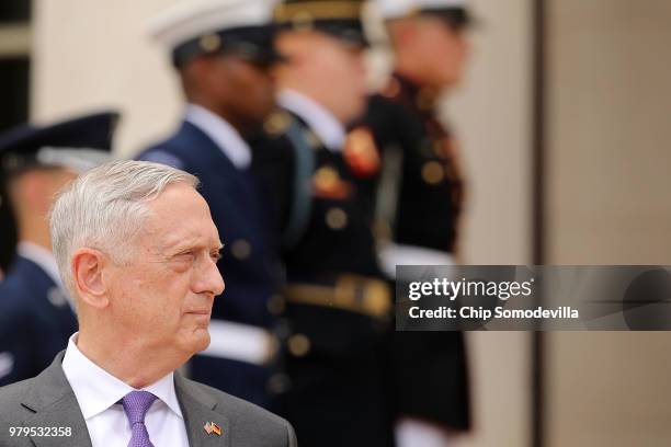 Defense Secretary James Mattis waits for the arrival of German Defence Minister Ursula von der Leyen outside the Pentagon June 20, 2018 in Arlington,...