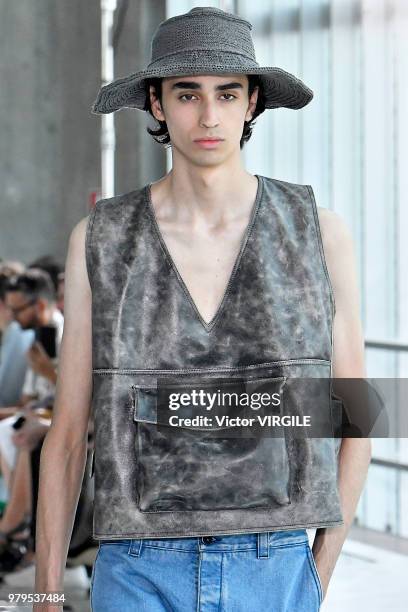 Model walks the runway at the Sunnei fashion show during Milan Men's Fashion Week Spring/Summer 2019 on June 17, 2018 in Milan, Italy.