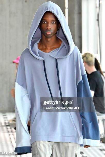 Model walks the runway at the Sunnei fashion show during Milan Men's Fashion Week Spring/Summer 2019 on June 17, 2018 in Milan, Italy.