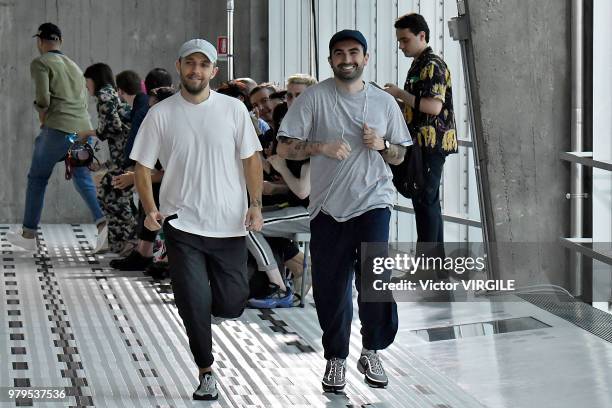 Designers Simone Rizzo and Loris Messina walk the runway at the Sunnei fashion show during Milan Men's Fashion Week Spring/Summer 2019 on June 17,...