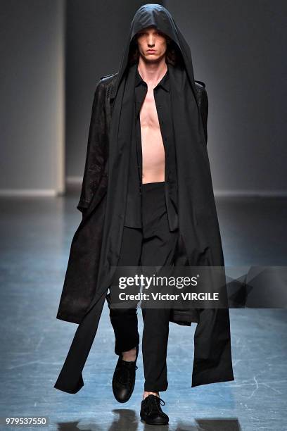 Model walks the runway at the Isabel Benenato fashion show during Milan Men's Fashion Week Spring/Summer 2019 on June 17, 2018 in Milan, Italy.