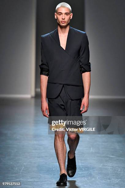 Model walks the runway at the Isabel Benenato fashion show during Milan Men's Fashion Week Spring/Summer 2019 on June 17, 2018 in Milan, Italy.