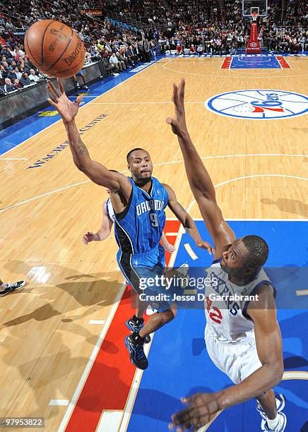 Rashard Lewis of the Orlando Magic shoots against Elton Brand of the Philadelphia 76ers during the game on March 22, 2010 at the Wachovia Center in...