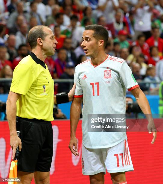 Lucas Vazquez of Spain argues with linesman Mauricio Espinoza during the 2018 FIFA World Cup Russia group B match between Iran and Spain at Kazan...