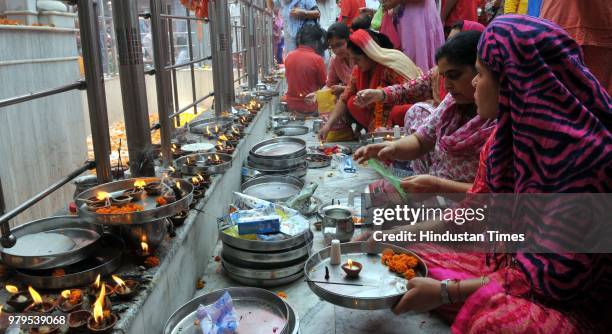 Devotees at the Mata Kheer Bhawani Temple during its annual festival, on June 20, 2018 in Jammu, India.