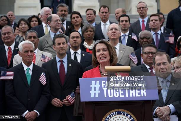 House Minority Leader Rep. Nancy Pelosi speaks as other House Democrats listen during a news conference in front of the U.S. Capitol June 20, 2108 in...