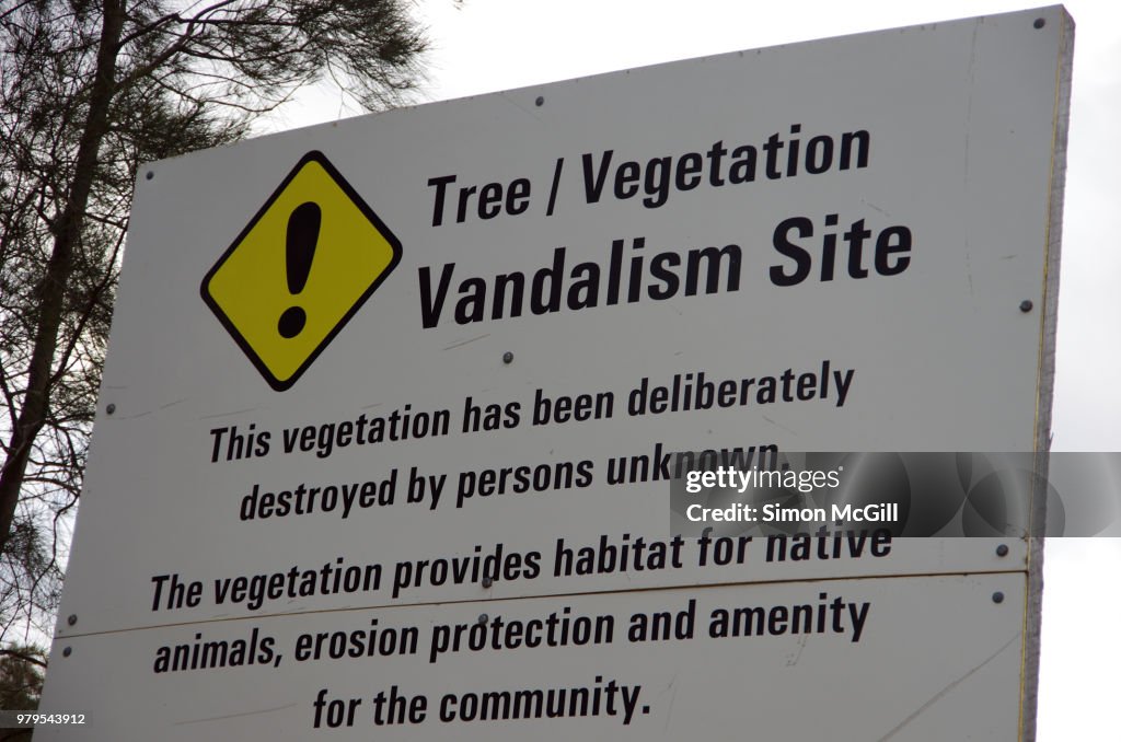 Sign indication a tree / vegetation vandalism site