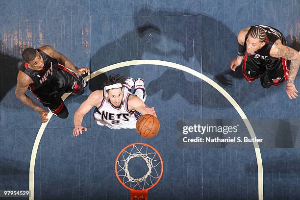 Josh Boone of the New Jersey Nets shoots against the Miami Heat on March 22, 2010 at the IZOD Center in East Rutherford, New Jersey. NOTE TO USER:...