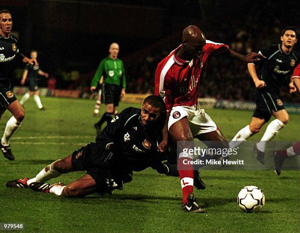 Richard Rufus of Charlton holds off the challenge of Frederic Kanoute of West Ham during the match between Charlton Athletic and West Ham United in...