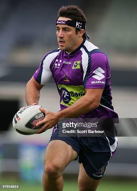 Cooper Cronk of the Storm runs with the ball during a Melbourne Storm NRL training session at Visy Park on March 23, 2010 in Melbourne, Australia.